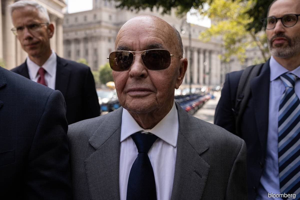 Billionaire Joe Lewis pleads guilty in insider trading case