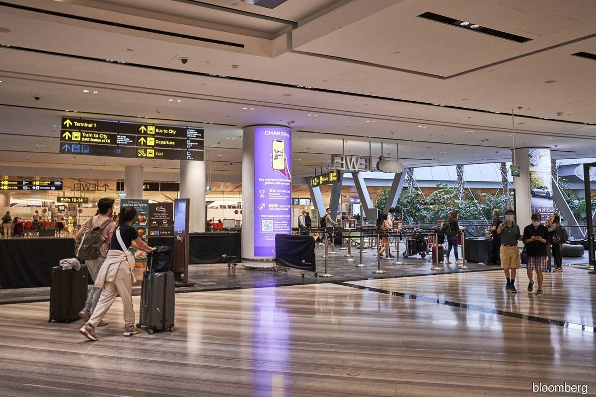 Singapore aims for passport-free departures from Changi Airport next year