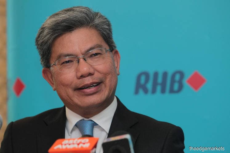 Umd Rashid Rhb Bank RHB cautiously optimistic of beating record FY18 performance