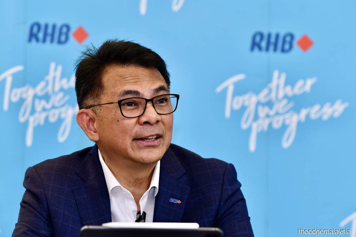 Cfo Rhb Bank RHB Bank 4Q net profit down 24% as provisions drag, declares second ...
